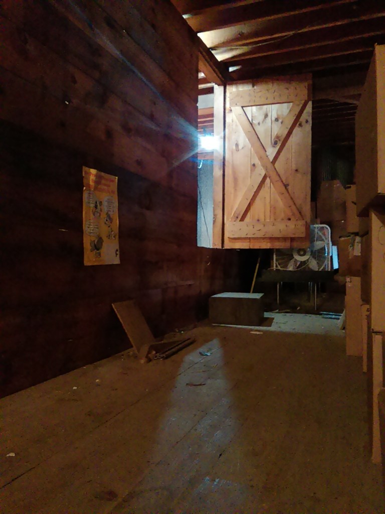 We ripped out this half door between loft sides